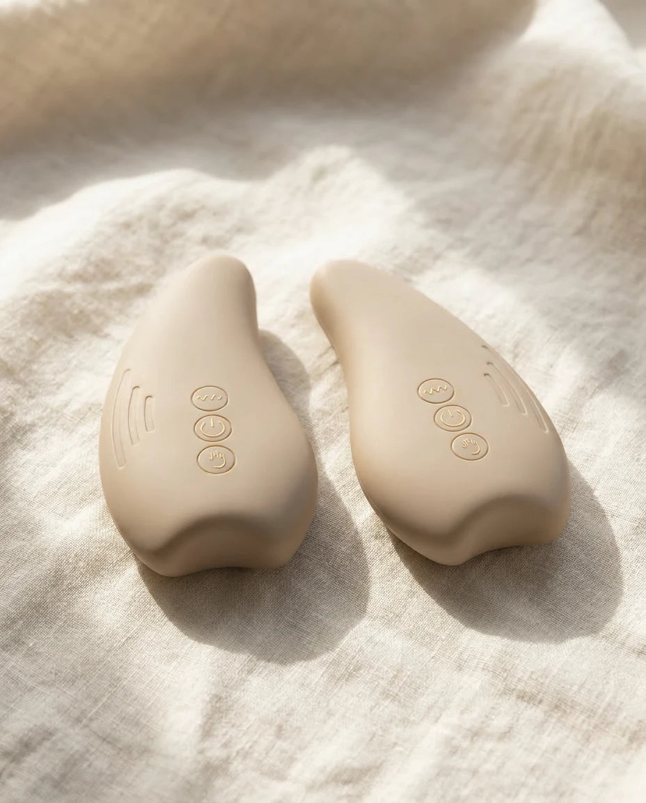 The MamaWarm pair on soft cream linen, sold as a pair.