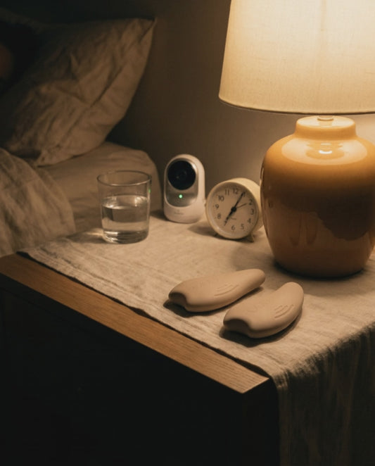 MamaWarm pads in use during a 2 a.m. moment, hands-free at the bedside.